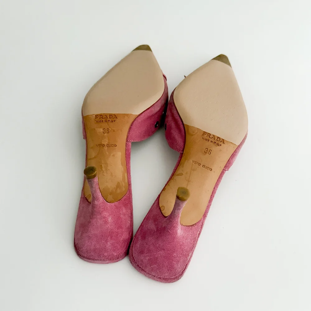 Prada Iconic Pink Eyelet Bow Mule Heels (IT 36) — sororité.